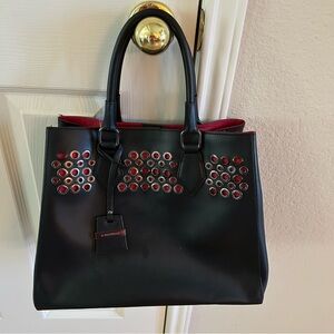 Black Satchel with Red Accent Eyelet Detail